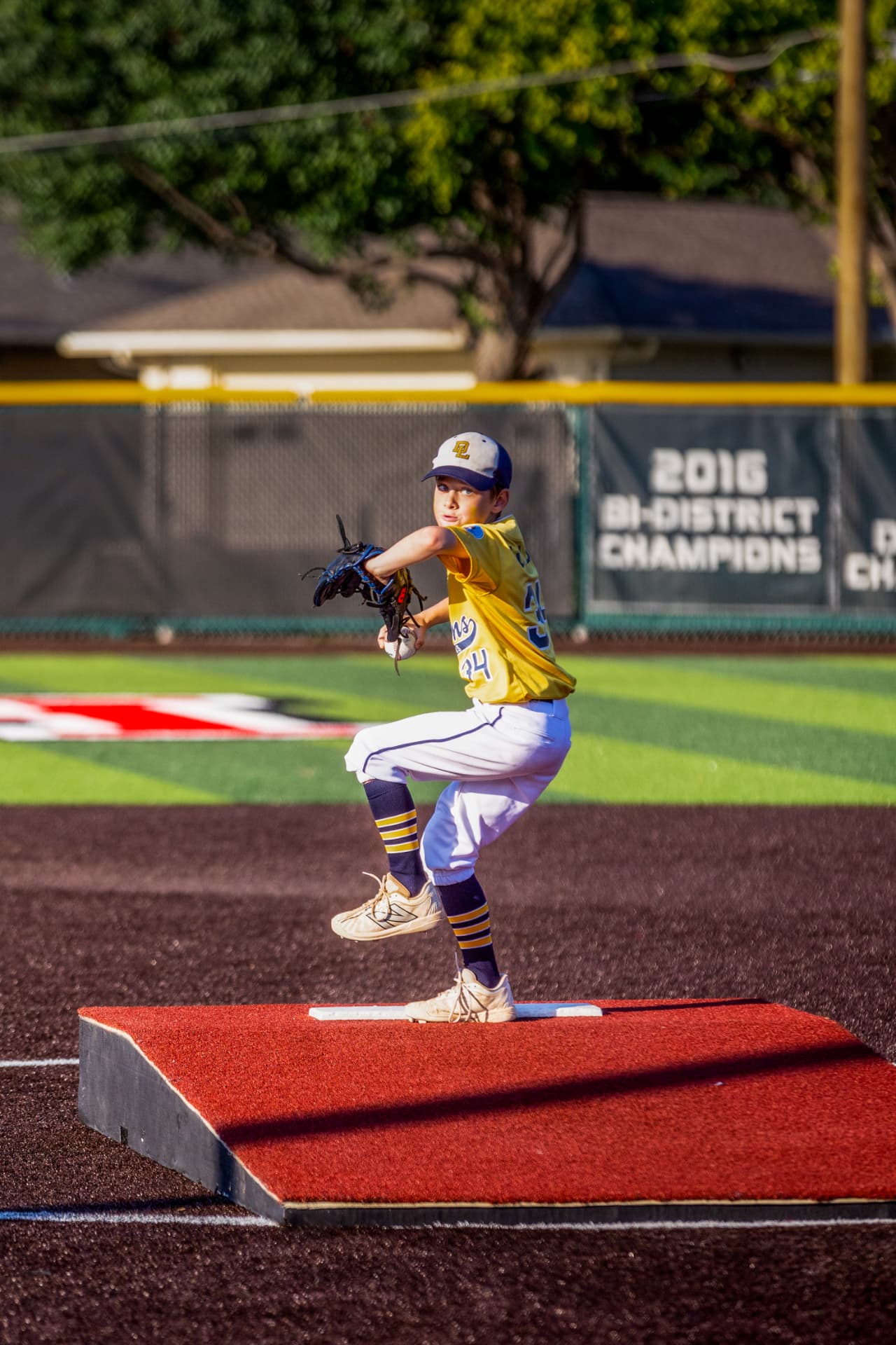 Youth pitcher set on the mound